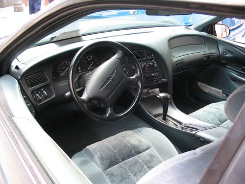 1993 Ford Taurus - Interior view of a car, showing the dashboard, steering wheel, and seats. The vehicle appears to be from the mid-1990s.