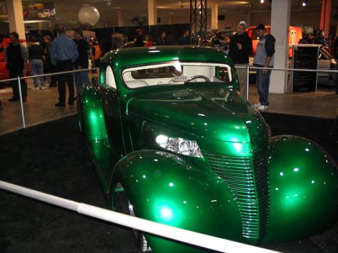 1993 Ford Taurus - This custom hot rod features a vibrant green paint job and classic styling elements.