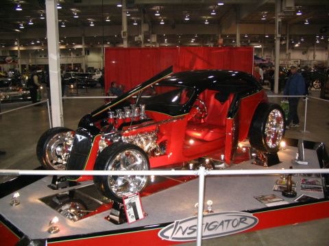 1993 Ford Taurus - This custom hot rod features a powerful V8 engine and a striking red and black color scheme.