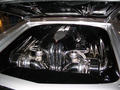 1993 Ford Taurus - Engine bay features polished chrome twin turbos and a custom black intake manifold.
