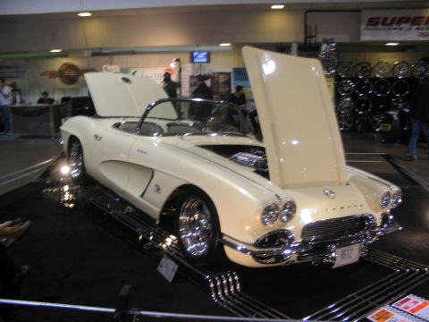 1993 Ford Taurus - This 1958 Chevrolet Corvette convertible is displayed with its hoods open, revealing the engine.