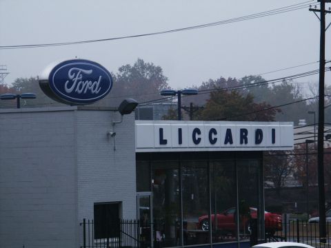 2001 Mercury Grand Marquis - Exterior view of a Liccardi Ford dealership, showing the prominent Ford logo and dealership name signage.