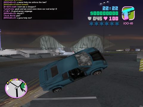 1990 Ford Probe - A blue car is shown tilted on its side in a video game environment with UI elements.