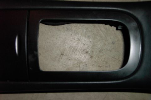 1996 Mercury Grand Marquis - The shifter bezel surround. Notice the damage. I refnished it prior to install with a lightly textured black paint for a factory look