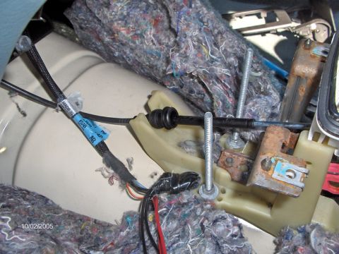 1996 Mercury Grand Marquis - The stock shifter cable, rerouted and floating on the new shifter. I used a ton of nylon locking 'zip' ties to secure it down. The shifter…