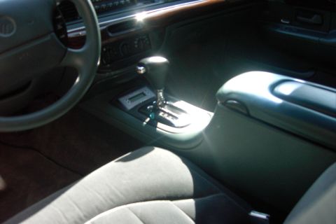 1996 Mercury Grand Marquis - Later on: I later relocated the scan gauge into the console, and trimmed the old ashtray/cupholder door for a perfect fit filler piece Bett…