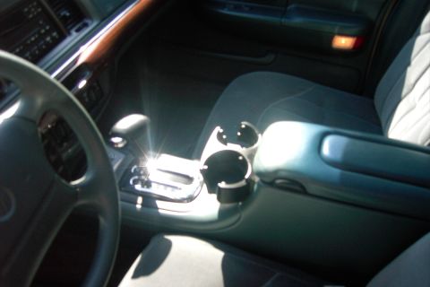 1996 Mercury Grand Marquis - Cupholders? Many have asked if I still have cupholders now. Well, yes! The console features a pair of trik retracting cupholders
