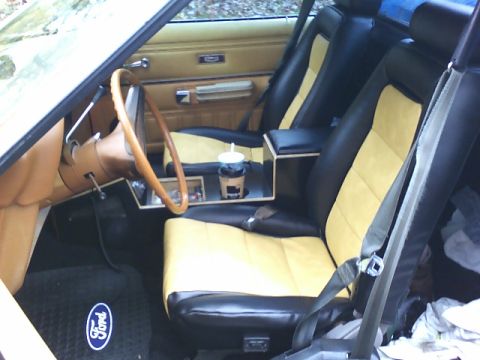 1979 Ford Ranchero - Interior view of a 1979 Ford Ranchero, showing the seats, dashboard, and steering wheel.