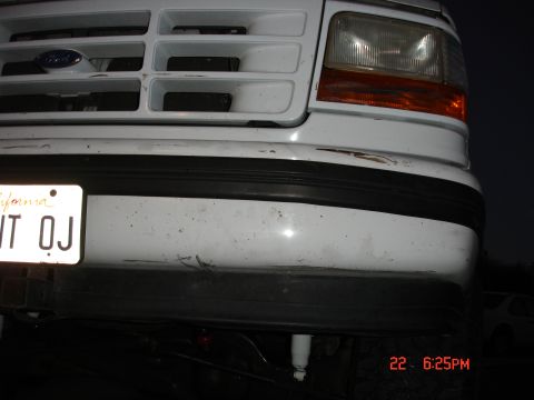 1996 Ford Bronco - Front view of a 1996 Ford Bronco, showing the grille, headlights, and bumper with a California license plate.