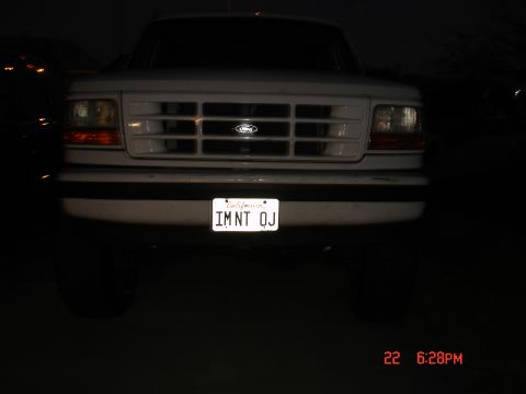 1996 Ford Bronco - Front view of a white 1992 Ford F-Series truck at night with a California license plate.
