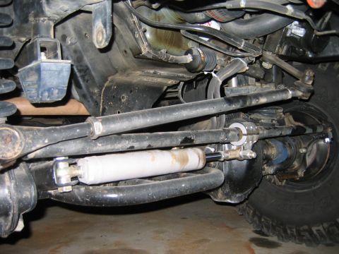 1985 Ford Bronco - Undercarriage view of a Ford Bronco's steering system components.