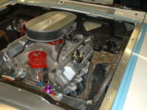 2005 Ford Mustang - Engine bay view shows a V8 engine with aftermarket components installed.