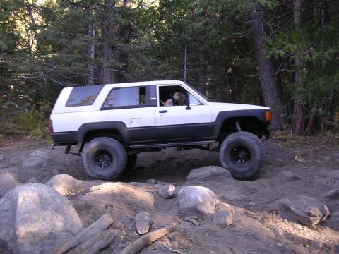 1985 Toyota 4Runner - This modified 1985 Toyota 4Runner navigates a challenging rocky terrain, its off-road capabilities.