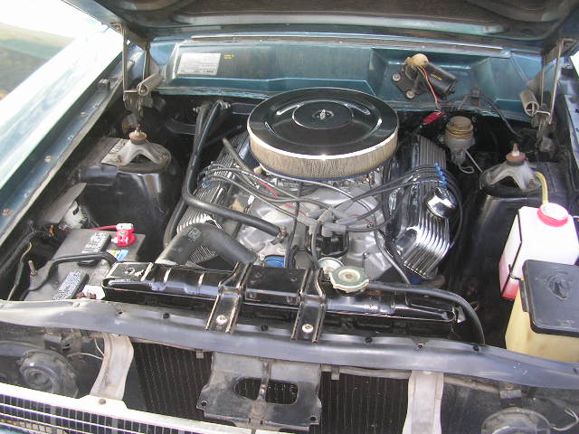 1975 Ford Ranchero engine bay with V8 engine, air cleaner, and radiator