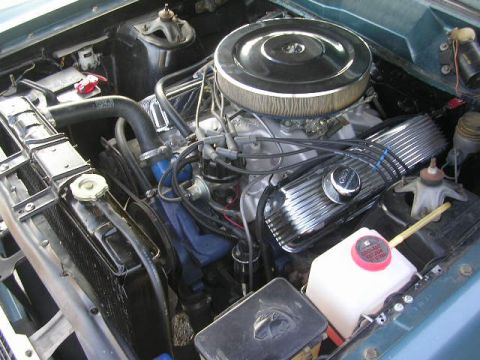 1975 Ford Ranchero - Close-up view of the engine compartment, showing various components and hoses.