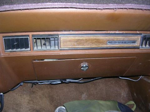 1975 Ford Ranchero - Interior view of a 1975 Ford Ranchero dashboard, showing the glove box and air vents.