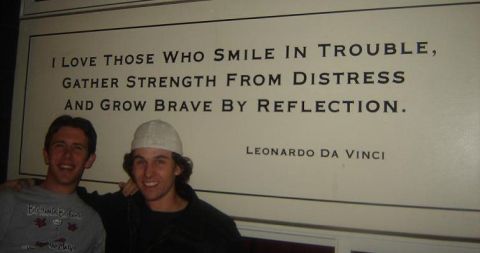 1996 Ford Probe - Two friends pose for a photo in front of a motivational quote on a wall.