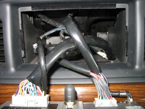 2003 Ford Crown Victoria - The dashboard wiring harness of a 2003 Ford Crown Victoria is visible after removal of interior trim.