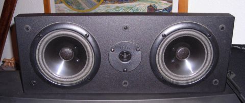 2003 Jeep TJ - A black speaker with dual woofers and a central tweeter is shown in a close-up view.