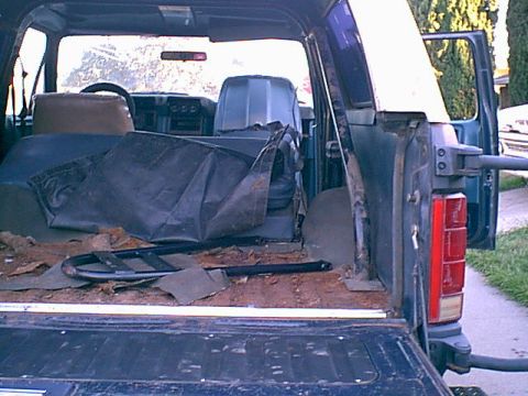 1983 Ford Bronco - Here is the rear leg pass side. (lots of rust on the floor surface. this is how she came to me i going to spray in a liner soon.