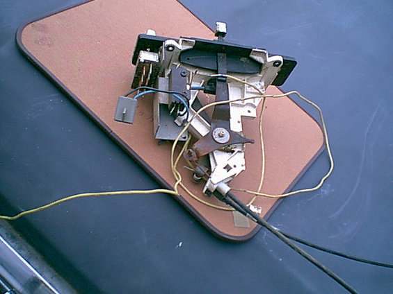 this is the top view. you can see where they just hacked in the ac wiring. i hate to have a fire because some one was lazy and did a poor install.