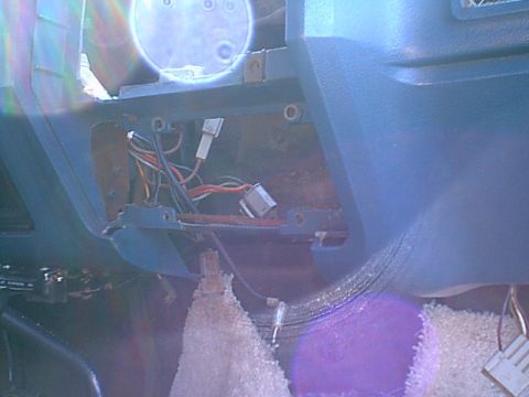 1983 Ford Bronco - well i had to open the dash up some more to make a good clean fit. You can see the wiring mess behind the dash.