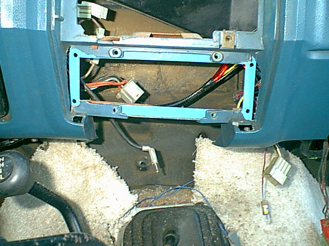 Here is the adapter mount in the install lacation.to clear up why i chopped out the dash it was to keep from chopping up the control panel ears.