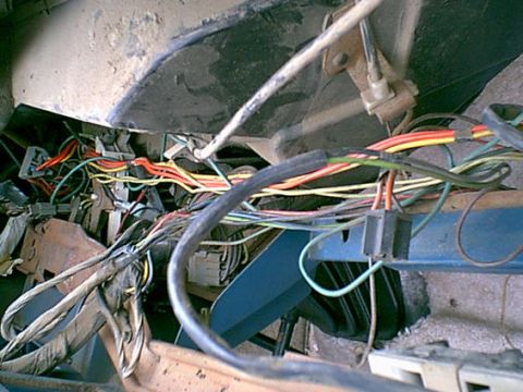 1983 Ford Bronco - Look at the wiring mess on the drivers side. this is the AC power and contol wires for the second fan and compressor and other AC related s…