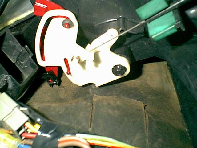 this changed the air direction from floor to defrost. this is all cable on 87/88 boxes and 89 up used vaccum pots to open and close the doors.