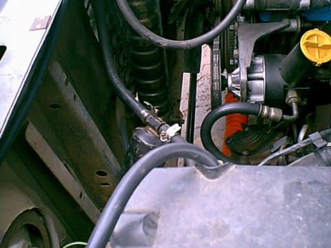 1983 Ford Bronco - Here is the connection that failed. They put a iron pipe inside the hose and it rusted away. the hose was loose and leaked. this goes to th…