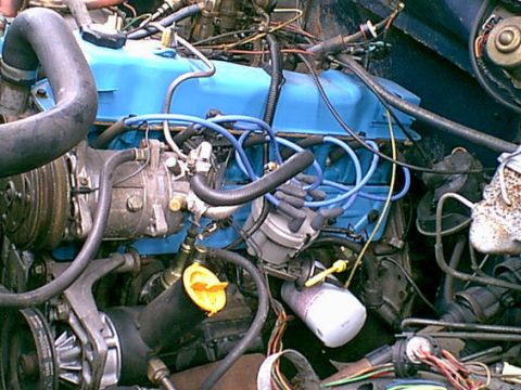 1983 Ford Bronco - This is the old AC compressor. i removed it to clean up the engine compartment. it was dead anyway.