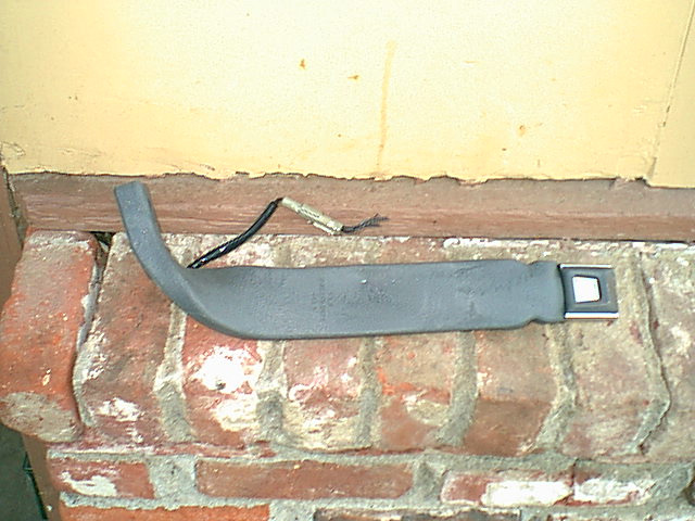 a different view of the correct belt bottom. I did not connect the belt sensor. the wires were gone on my bronco.