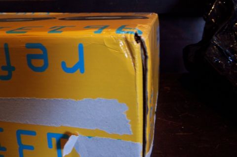 1990 Ford Bronco - Exterior damage to the corners of the box