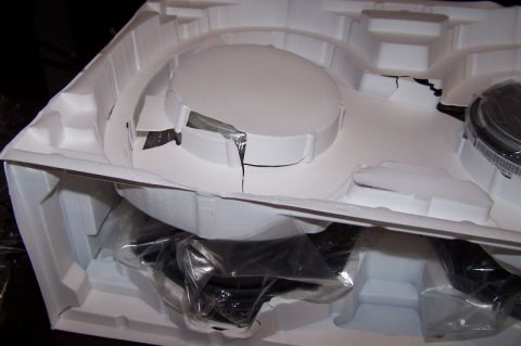 1990 Ford Bronco - ...and under the second speaker cover.