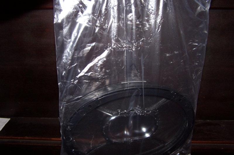 If you look closely at the plastic bag, you can see evidence of grinding on the bag.  This wasn't something that happened all at once.