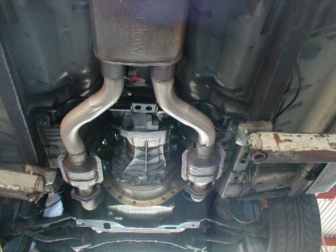 1993 Ford Thunderbird - This photo shows the undercarriage of a vehicle, focusing on the transmission and exhaust system.