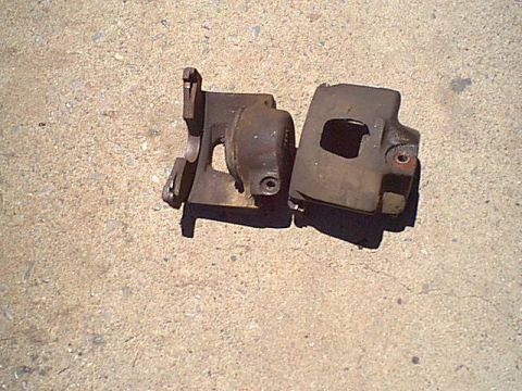 1983 Ford Bronco - Here are the old calipers. i was going to rebuild them but they are $26 each remanufatured. So off they go.