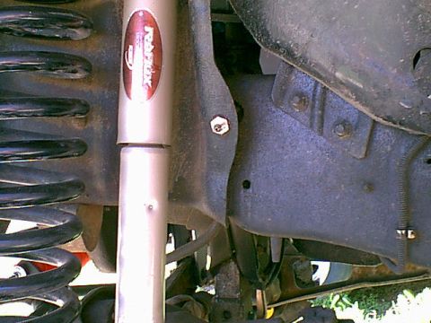 1983 Ford Bronco - To get the new lines to work with the bronco i needed to install AN adapters. on the drivers side frame i removed the rubber flex line from…