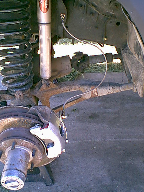 1983 Ford Bronco - the drivers side is now completed. The rotor looks good and will not need to be replaced at this time.