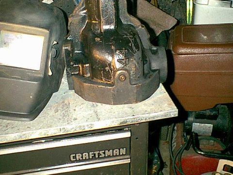 1983 Ford Bronco - Here the drop out is with the new drain plug. I found out the bearing caps were changed and i need to recenter drill this one or get anothe…