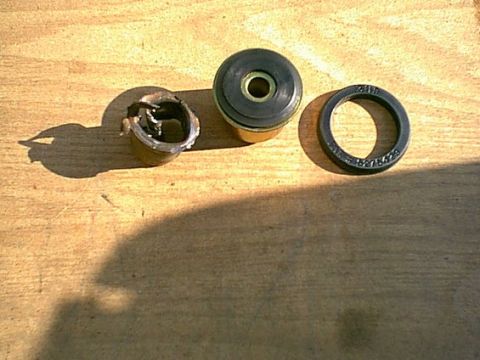 1983 Ford Bronco - the old mounts do not come out too easy. i used the drill many holes in the rubber and then an air chisle to push out the center sleave and…