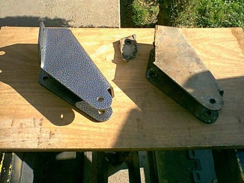 1983 Ford Bronco - Here is a side shot of the failed mount and the new mount. The Pivot bushing goes in the center bottom hole.
