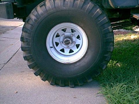 1983 Ford Bronco - Here is the drivers side ball joint replacement. Here we are with the wheel in place.
