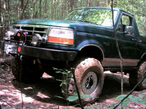 1996 Ford Bronco - This 1996 Ford Bronco is equipped with a winch and large off-road tires, ready for the trail.