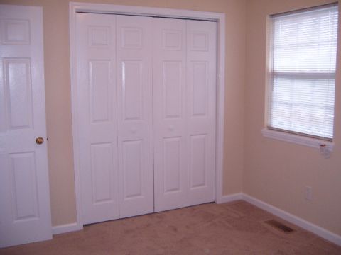 1988 Ford Bronco - This image shows the interior of a room, bi-fold closet doors and a window with blinds. The registry information for a 1988 Ford Bronco doe…