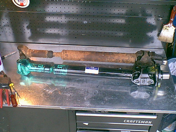 Here is the new and old drive shaft. you can see the difference.