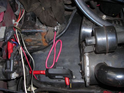 1995 Ford Bronco - Wiring and components are visible in the engine bay, including a fuse holder and various cables.