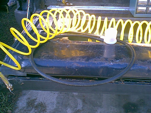 I want to play in the water and do not want it in my axlex so i looked at a few different ideas. i had these parts sitting atound. fuel line, honda fuel filter and a coiled air compressor line.