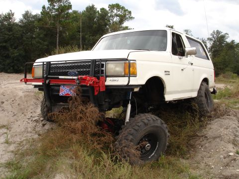 1989 Ford Bronco - This modified 1989 Ford Bronco is equipped for off-road adventures with its lifted suspension and tires.