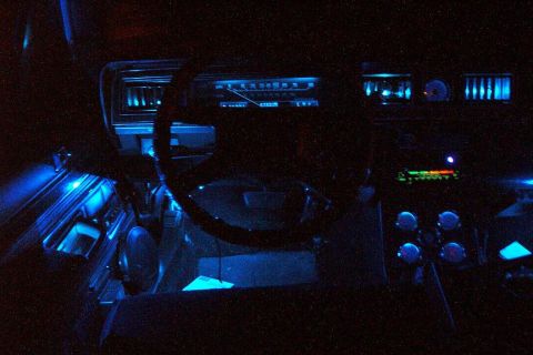 1985 Ford Crown Victoria LTD - Interior view of a car with custom blue ambient lighting installed.
